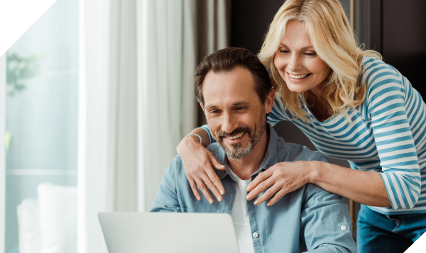 couple reviewing credit report on computer