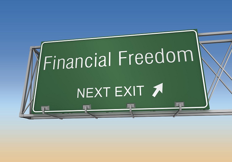 a highway sign indicating the direction to financial freedom